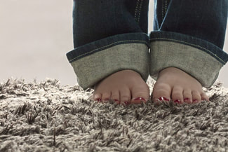 Kids feet on new carpet